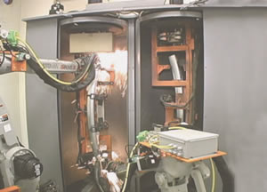 Motoman Robot Laser Cutting Auto Bumpers from Yaskawa America, Inc.